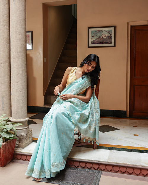 Aqua Blue Silk Linen Saree with Zari Border