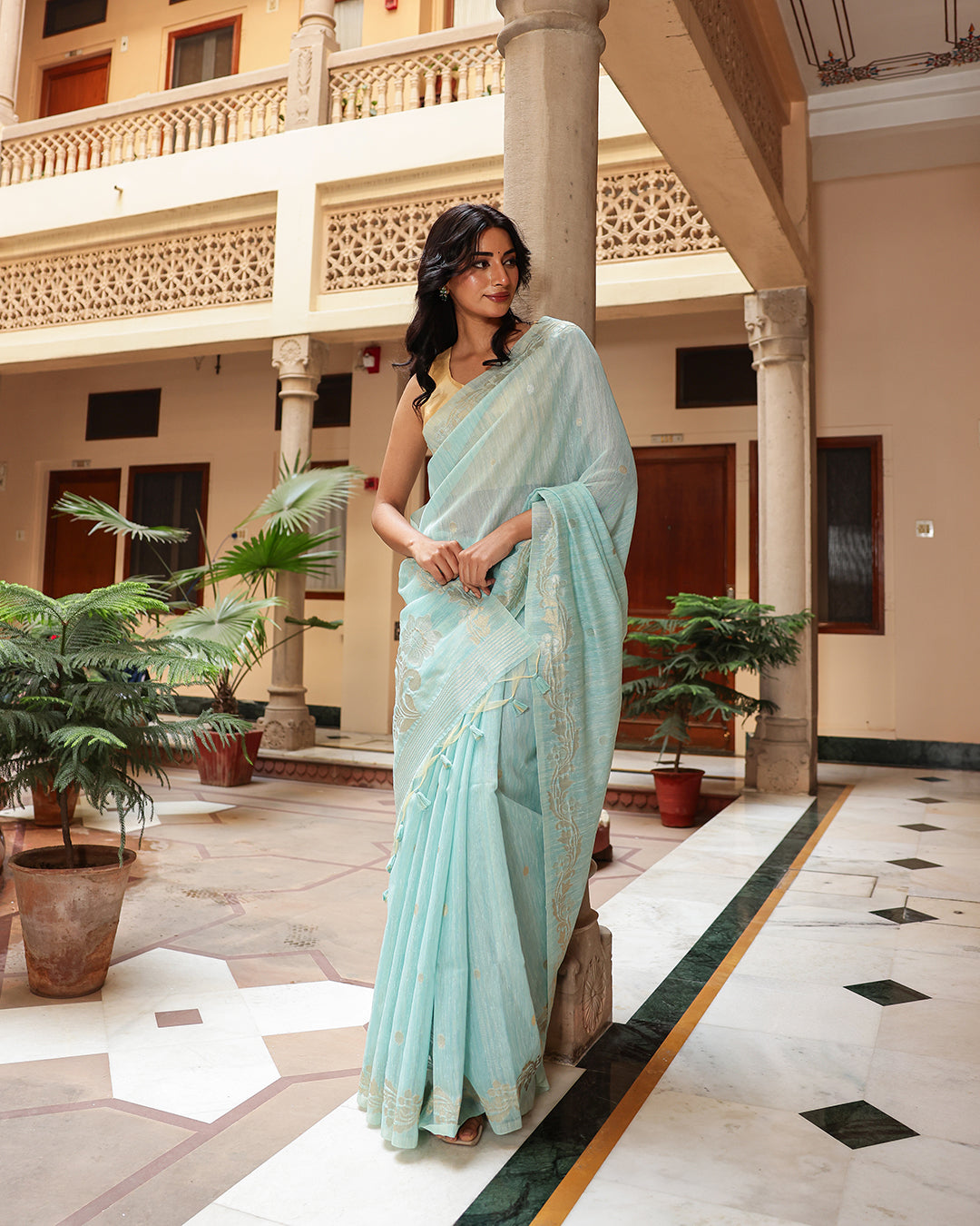 Aqua Blue Silk Linen Saree with Zari Border