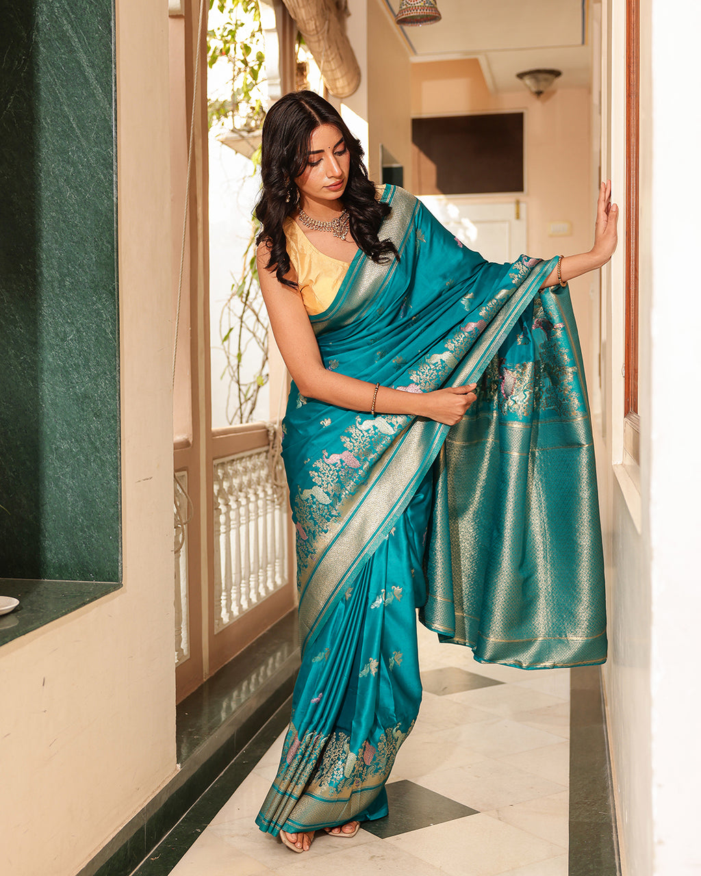 Teal Blue Peacock Border Silk Saree