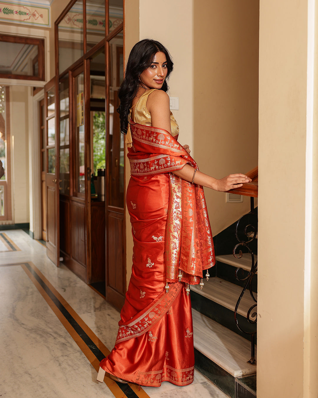 Rust Orange Dola Silk Animal Motif Saree