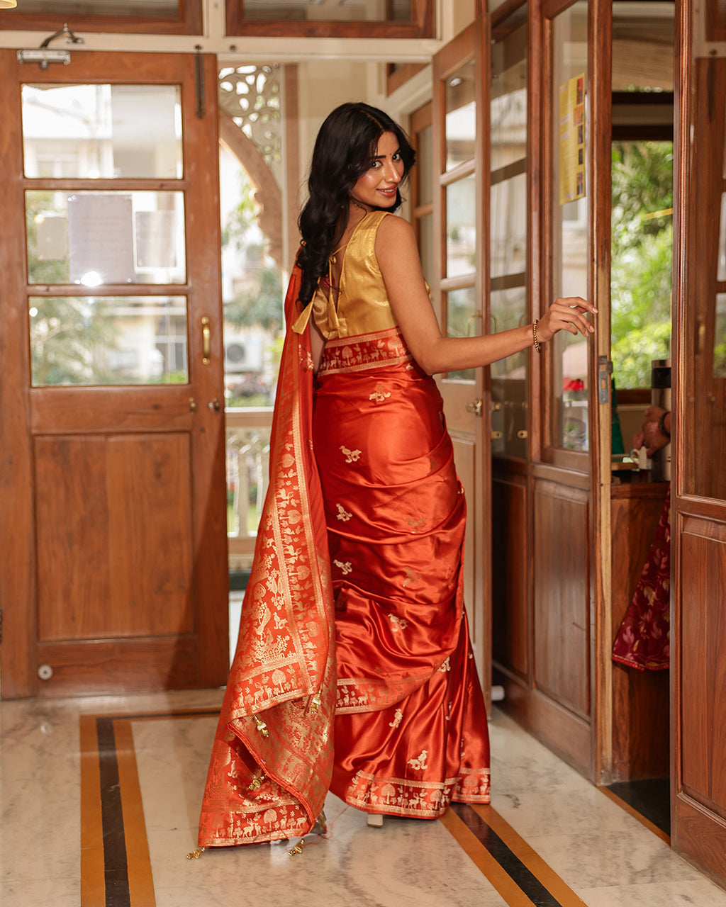 Rust Orange Dola Silk Animal Motif Saree
