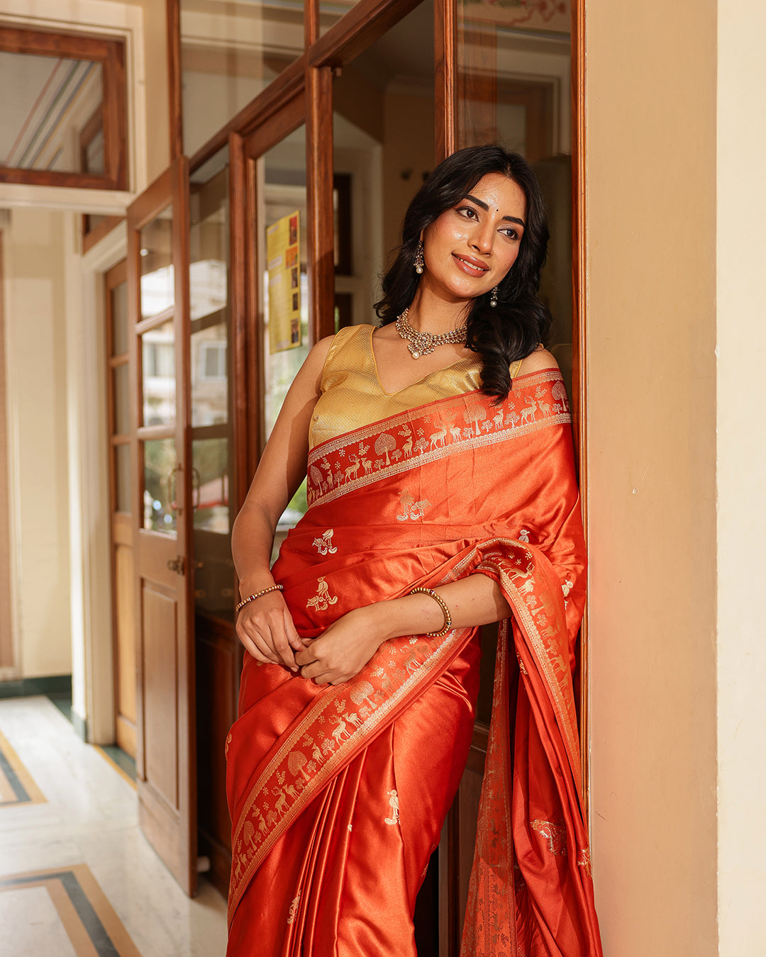 Rust Orange Dola Silk Animal Motif Saree
